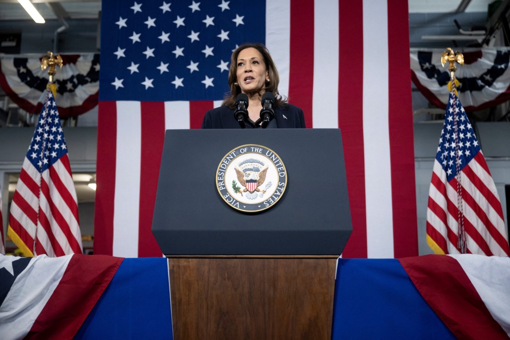 US Vice President Kamala Harris speaks to supporters at the Redford Fire Department on October 4, 2024 in Redford, Michigan. (Photo by Brendan Smialowski / AFP) (Photo by BRENDAN SMIALOWSKI/AFP via Getty Images)