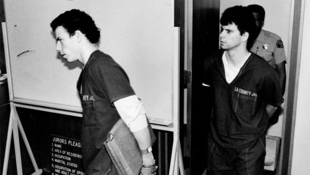 Erik and Lyle Menendez walking handcuffed.