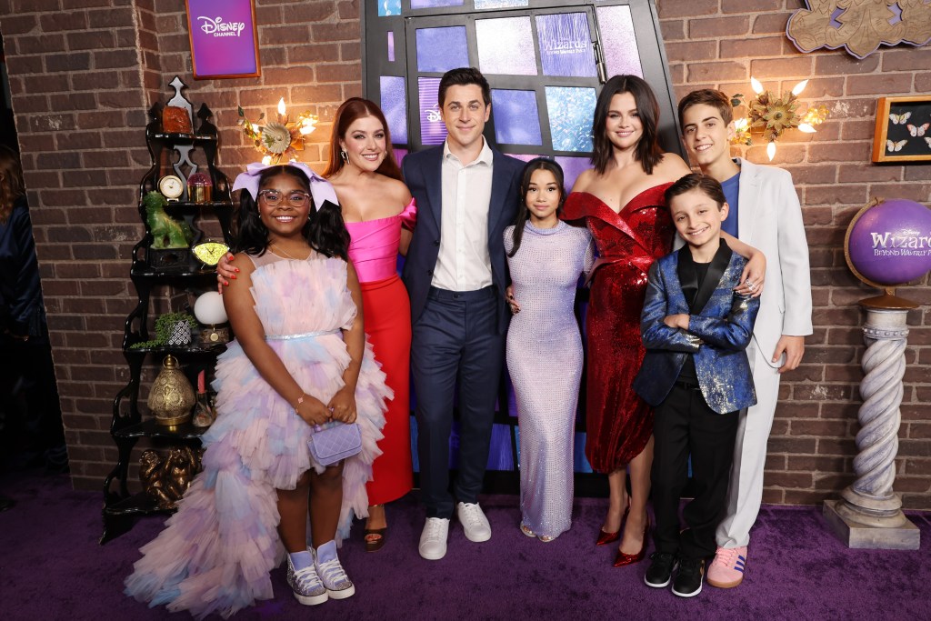 LOS ANGELES, CALIFORNIA - OCTOBER 28: (L-R) Taylor Cora, Mimi Gianopulos, David Henrie, Janice LeAnn Brown, Selena Gomez, Max Matenko and Alkaio Thiele attend the World Premiere of Disney's "Wizards Beyond Waverly Place" at El Capitan Theatre on October 28, 2024 in Los Angeles, California. (Photo by Amy Sussman/WireImage)