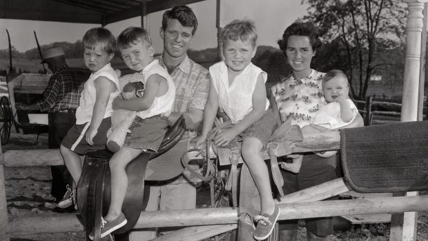 (Original Caption) Robert Kennedy, now a Senate Committee investigator, is shown with his wife, Ethel, and four of their five children. The children, from left, are: David Anthony, 1 1/2; Robert Francis, 3; Joseph Pat, 4 and Mary Courtney, 7 months. Kathleen, 5, is not shown in the photo which was taken at Kennedy's McLean, Virginia home.