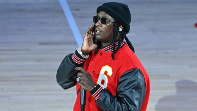 ATLANTA, GEORGIA - NOVEMBER 17:  Rapper Young Thug performs at halftime during the Boston Celtics v Atlanta Hawks game at State Farm Arena on November 17, 2021 in Atlanta, Georgia. (Photo by Paras Griffin/Getty Images)