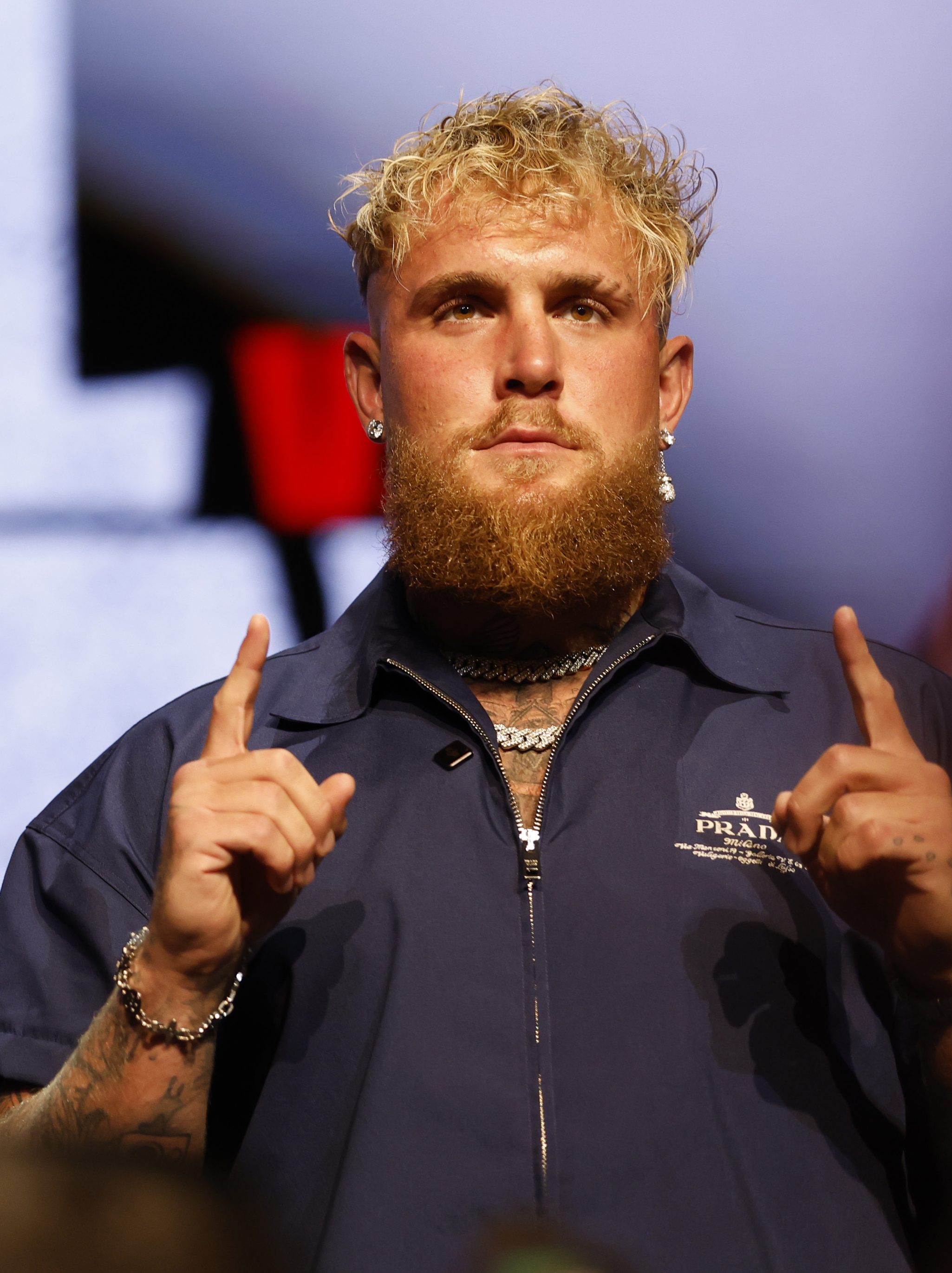NEW YORK, NEW YORK - MAY 13: (L-R) Mike Tyson and Jake Paul speak onstage at the press conference in promotion for the upcoming Jake Paul vs. Mike Tyson boxing match at The Apollo Theater on May 13, 2024 in New York City. (Photo by Sarah Stier/Getty Images for Netflix)