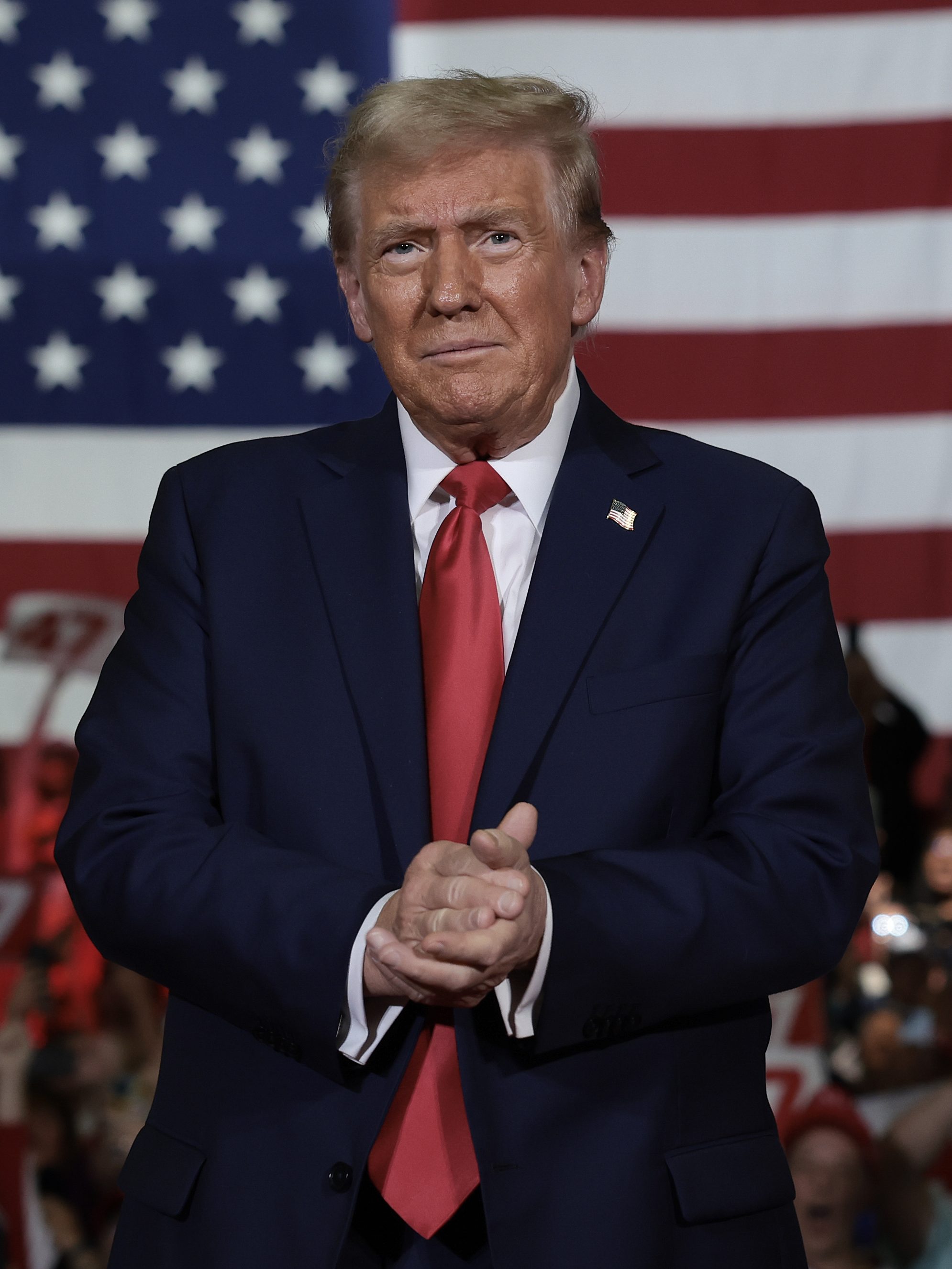 LANCASTER, PENNSYLVANIA - OCTOBER 20: Republican presidential nominee, former U.S. President Donald Trump, arrives on stage during a town hall campaign event at the Lancaster County Convention Center on October 20, 2024 in Lancaster, Pennsylvania. Trump is campaigning the entire day in the state of Pennsylvania. Trump and Democratic presidential nominee Vice President Kamala Harris continue to campaign in battleground swing states ahead of the November 5 election.  (Photo by Win McNamee/Getty Images)