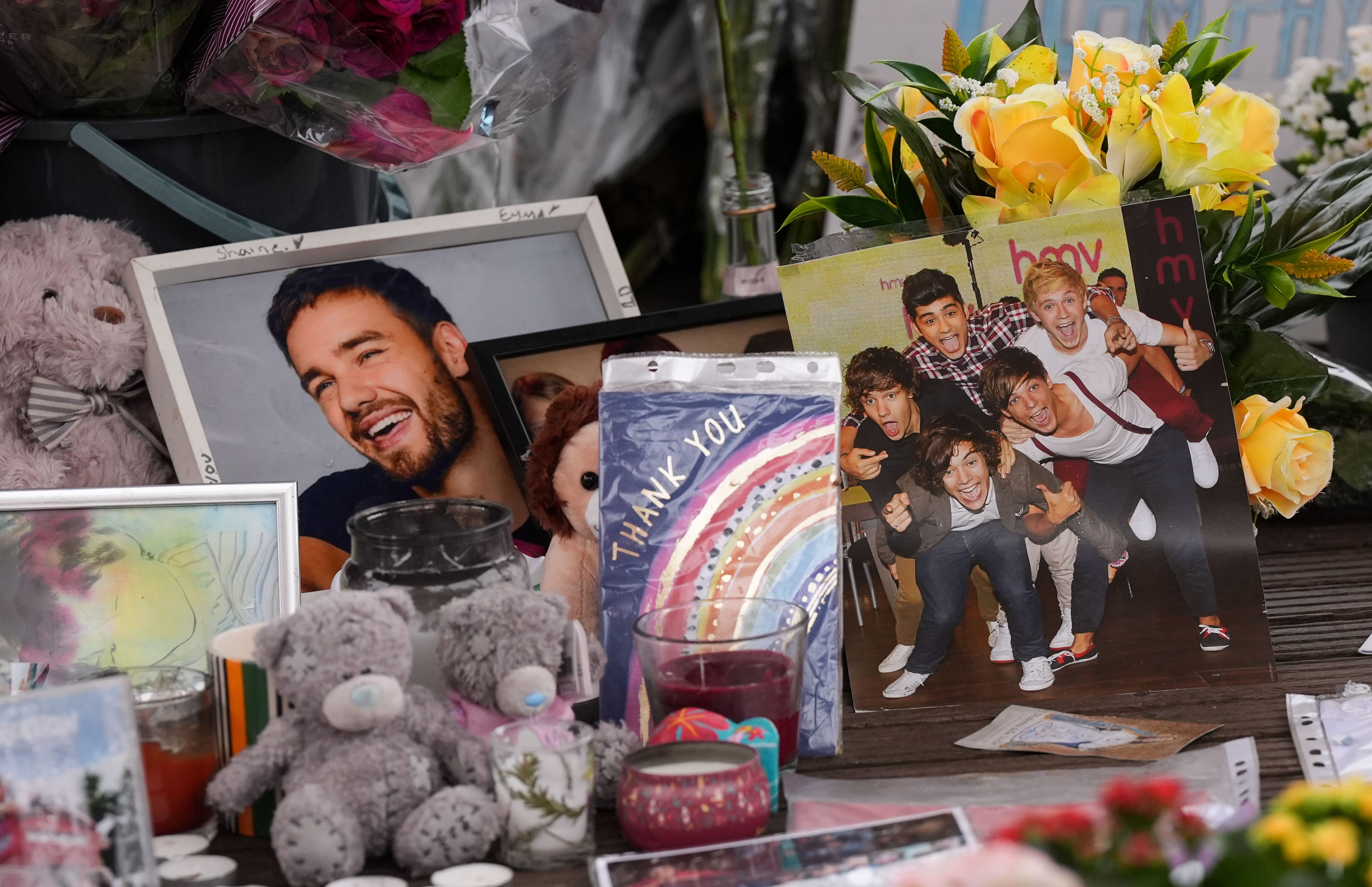 Floral tributes to singer Liam Payne which have been moved by authorities to West Park in his hometown of Wolverhampton. The former One Direction star died after falling from a third-floor balcony of the Casa Sur Hotel in Buenos Aires last month, at the age of 31. The public prosecutor's office in Argentina has said three people have been charged in connection with Mr Payne's death. Picture date: Friday November 8, 2024. (Photo by Jacob King/PA Images via Getty Images)
