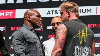 IRVING, TEXAS - NOVEMBER 13: Mike Tyson and Jake Paul pose at a press conference at the Toyota Music Factory in Irving, Texas on November 13, 2024 for their heavyweight world titles of the Premiere Boxing Championship which will be on November 15 Friday night at AT&T Stadium in Arlington, Texas, United States. (Photo by Tayfun Coskun/Anadolu via Getty Images)