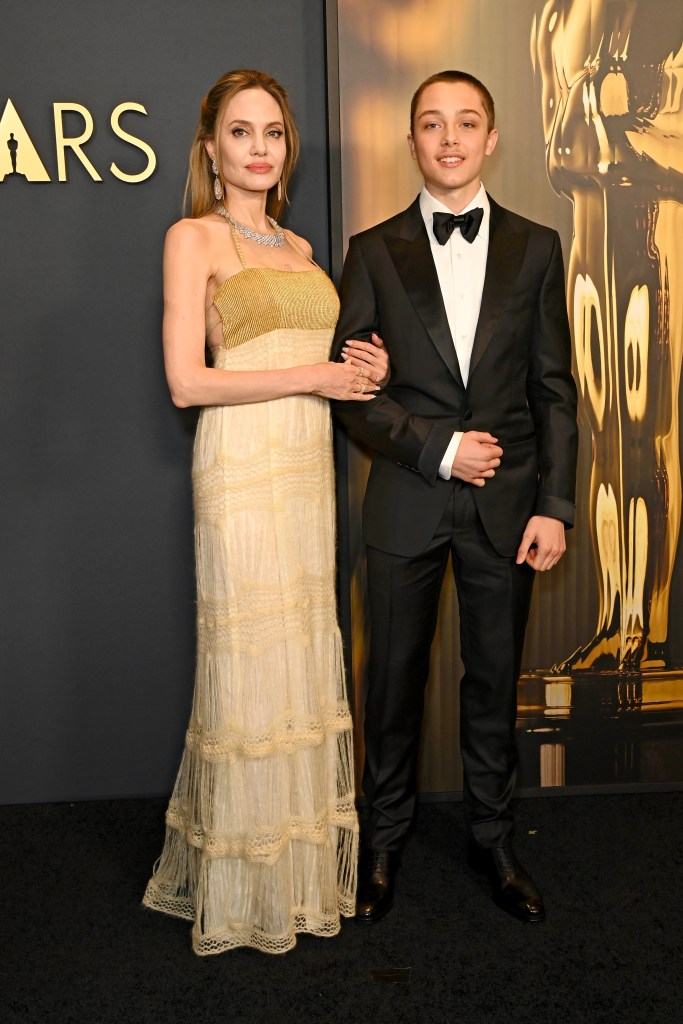 HOLLYWOOD, CALIFORNIA - NOVEMBER 17: (L-R) Angelina Jolie and Knox Jolie-Pitt attend the 2024 Governors Awards at Dolby Theatre on November 17, 2024 in Hollywood, California.  (Photo by Jon Kopaloff/Getty Images)