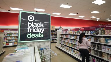 A woman shops at a Target store in Chicago on November 26, 2024, ahead of the Black Friday shopping day. (Photo by KAMIL KRZACZYNSKI / AFP) (Photo by KAMIL KRZACZYNSKI/AFP via Getty Images)