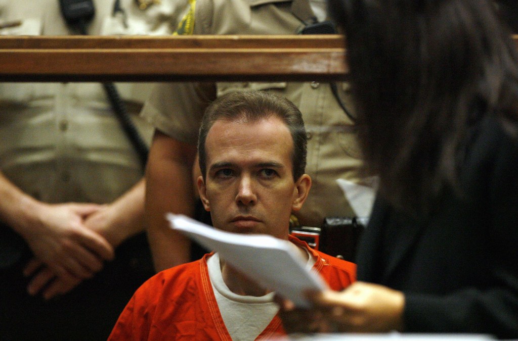 Los Angeles, UNITED STATES:  Murder suspect John Mark Karr appears at his extradition hearing at the Los Angeles Superior Court in Los Angeles, California, 22 August 2006. Karr, the suspect in the killing of child beauty queen JonBenet Ramsey, was in court Tuesday for a hearing to extradite him to Colorado, where the decade-old crime was committed. The 41-year-old teacher, whose surprising arrest in Thailand last week triggered a new media frenzy over the tragic case, spent the day in jail 21 August, after his arrival from Bangkok over the weekend. AFP PHOTO/POOL/ MARIO ANZUONI  (Photo credit should read MARIO ANZUONI/AFP via Getty Images)