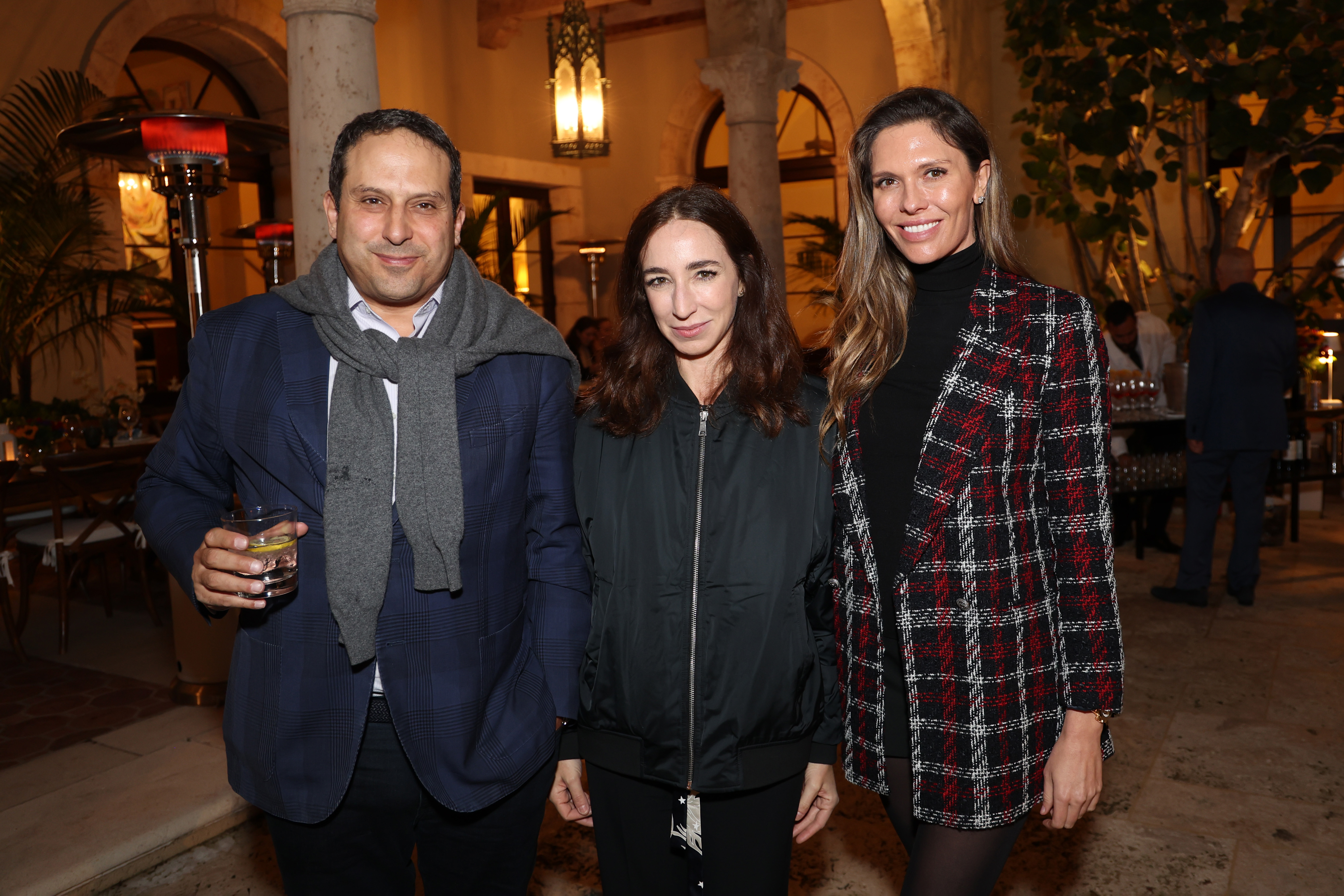 WEST PALM BEACH, FLORIDA - DECEMBER 27: Farhad Farman, Silvia Di Paolo, and Bettina Anderson attend a private dinner following the screening of "Treasure Of His Youth: The Photographs of Paolo Di Paolo" on December 27, 2022 in West Palm Beach, Florida. (Photo by Rodrigo Varela/Getty Images for Little Bear Inc.)