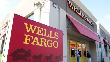 SAN BRUNO, CALIFORNIA - APRIL 14: Customers use ATMs at a Wells Fargo Bank on April 14, 2023 in San Bruno, California. Wells Fargo reported better-than-expected first quarter earnings of $5 billion, a 32 percent increase from earnings of $3.8 billion one year ago. (Photo by Justin Sullivan/Getty Images)