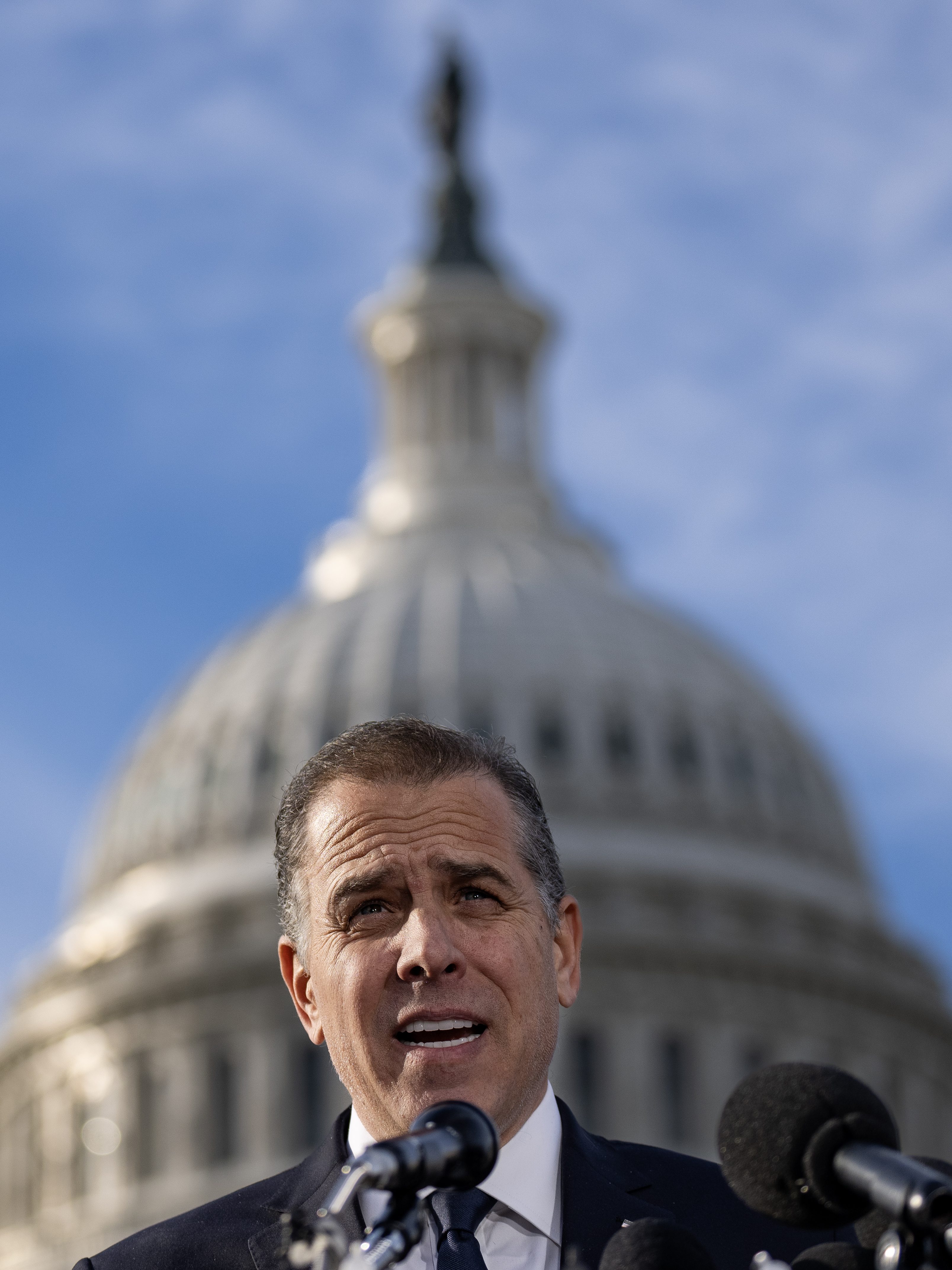WASHINGTON, DC - DECEMBER 13: U.S. President Joe Biden's son Hunter Biden talks to reporters outside the U.S. Capitol on December 13, 2023 in Washington, DC. Hunter Biden defied a subpoena from Congress to testify behind closed doors ahead of a House vote on an impeachment inquiry against his father. (Photo by Drew Angerer/Getty Images)