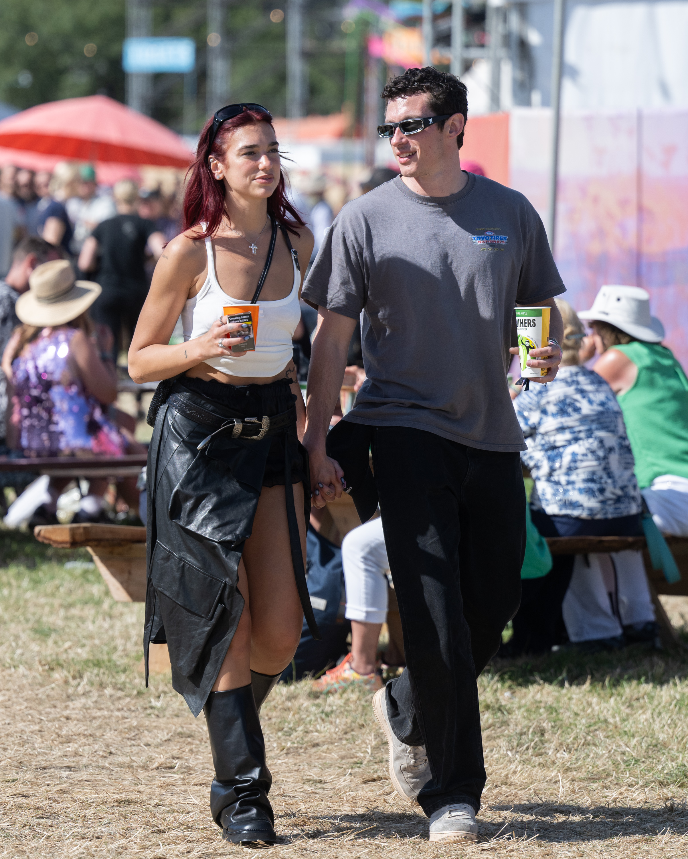 Dua Lipa & Callum Turner: Pics of the Couple day four of Glastonbury Festival 2024 at Worthy Farm, Pilton on June 29, 2024 in Glastonbury, England.