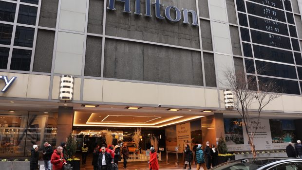 NEW YORK, NEW YORK - DECEMBER 04: The Hilton Hotel in Midtown Manhattan stands where United Healthcare CEO Brian Thompson was fatally shot on December 04, 2024 in New York City. Brian Thompson was shot and killed before 7:00 AM this morning outside the Hilton Hotel, just before he was set to attend the company's annual investors' meeting. (Photo by Spencer Platt/Getty Images)