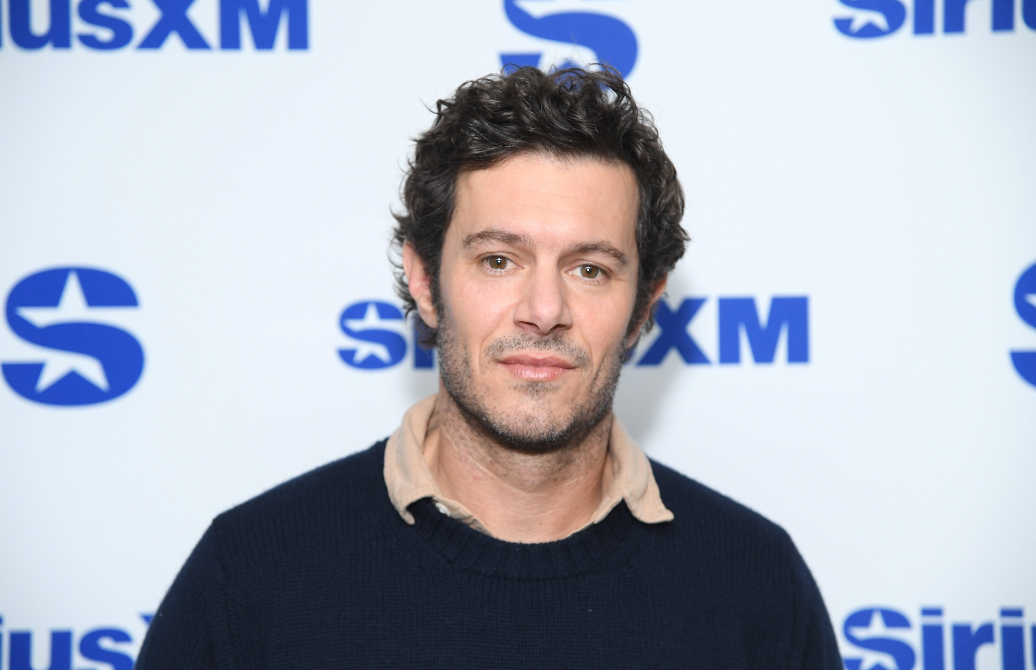 NEW YORK, NEW YORK - DECEMBER 04: Adam Brody visits SiriusXM Studios on December 04, 2024 in New York City. (Photo by Gary Gershoff/Getty Images)
