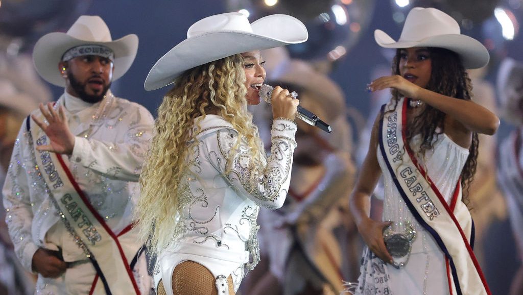 HOUSTON, TEXAS - DECEMBER 25: Beyoncé performs with daughter, Blue Ivy, during the halftime show for the game between the Baltimore Ravens and the Houston Texans at NRG Stadium on December 25, 2024 in Houston, Texas. (Photo by Alex Slitz/Getty Images)