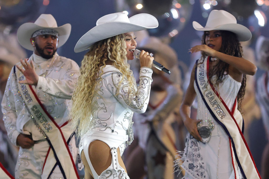 HOUSTON, TEXAS - DECEMBER 25: Beyoncé performs with daughter, Blue Ivy, during the halftime show for the game between the Baltimore Ravens and the Houston Texans at NRG Stadium on December 25, 2024 in Houston, Texas. (Photo by Alex Slitz/Getty Images)