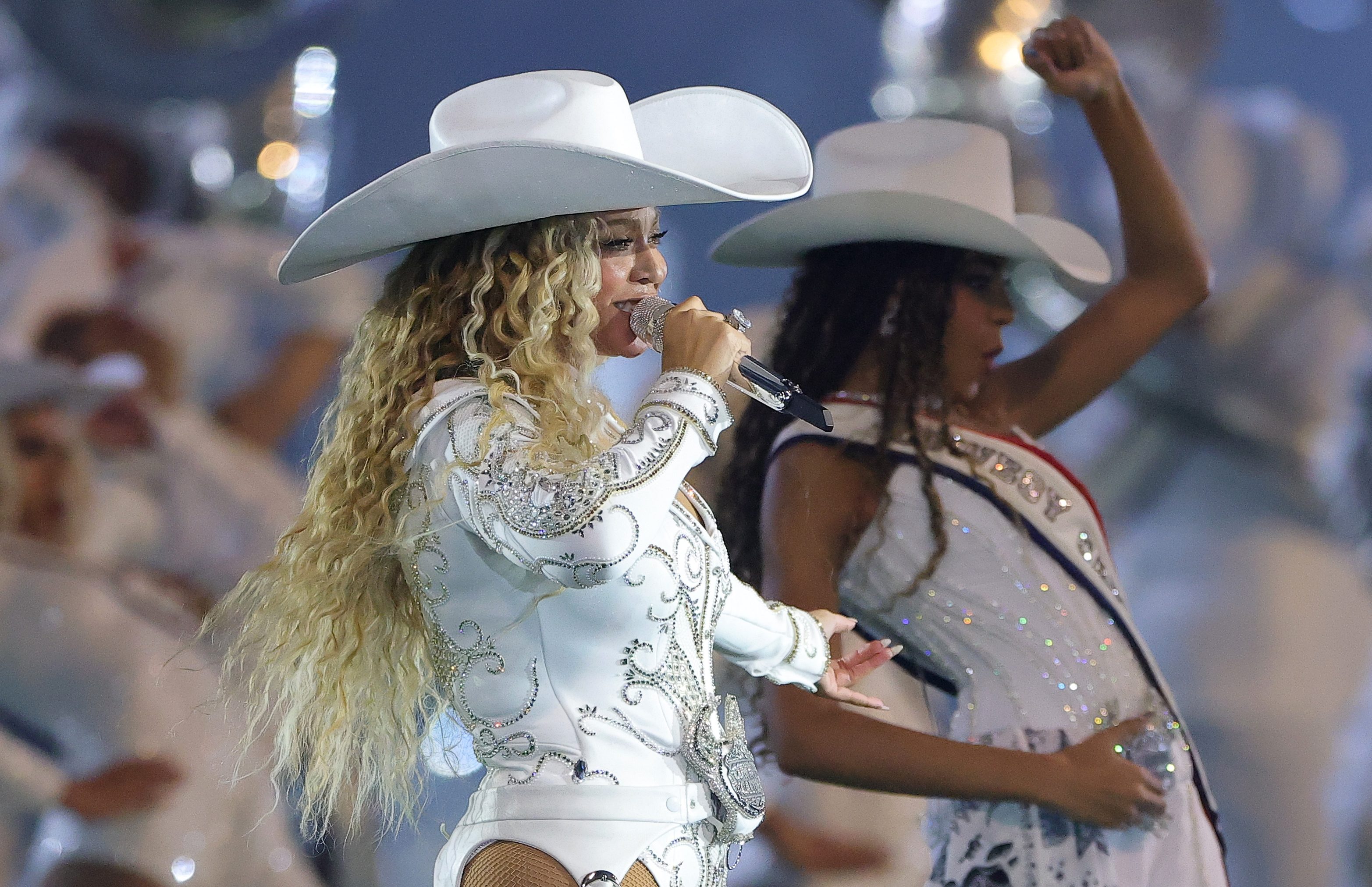 HOUSTON, TEXAS - DECEMBER 25: Beyoncé performs with daughter, Blue Ivy, during the halftime show for the game between the Baltimore Ravens and the Houston Texans at NRG Stadium on December 25, 2024 in Houston, Texas. (Photo by Alex Slitz/Getty Images)