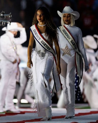 HOUSTON, TEXAS - DECEMBER 25: Blue Ivy walks onto the field for the Beyoncé halftime show during an NFL football game between the Baltimore Ravens and the Houston Texans, at NRG Stadium on December 25, 2024 in Houston, Texas. (Photo by Brooke Sutton/Getty Images)