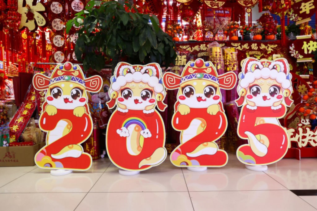 BEIJING, CHINA - DECEMBER 29: Festive decorations are on sale at a market ahead of the upcoming 2025 Chinese New Year, the Year of the Snake, on December 29, 2024 in Beijing, China. As the Spring Festival approaches, residents across China are shopping for festive decorations such as red lanterns, couplets and zodiac-themed ornaments recently, contributing to a pre-holiday consumption boom. (Photo by Chen Xiaogen/VCG via Getty Images)