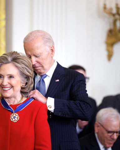 WASHINGTON, DC - JANUARY 4: Former U.S. Secretary of State Hillary Clinton is awarded the Presidential Medal of Freedom by U.S. President Joe Biden in the East Room of the White House on January 4, 2025 in Washington, DC. President Biden is awarding 19 recipients with the nation's highest civilian honor. (Photo by Tom Brenner/Getty Images)